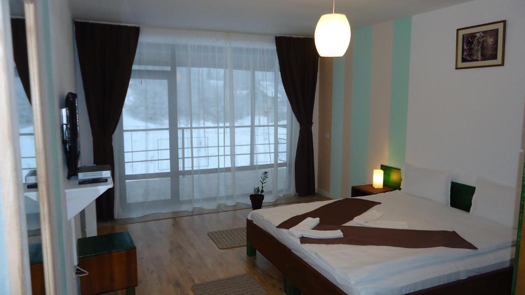Hotel Ezio House Timisu de Jos Pokoj fotografie